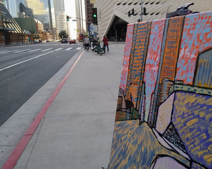 photo of painting on easel in downtown los angeles by oscar will
