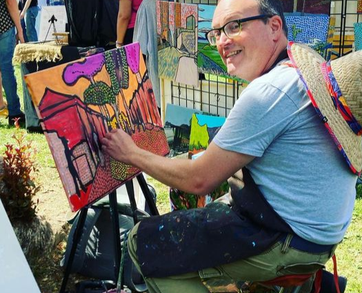 oscar will painting en plein air at the art festival