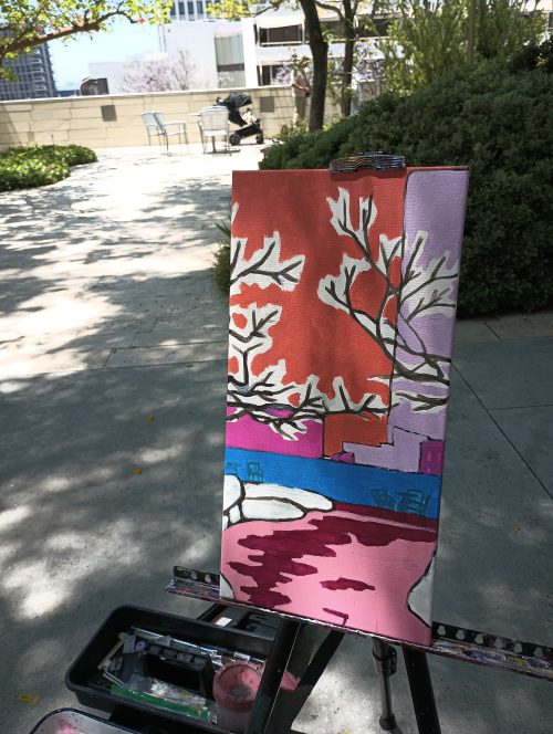 painting on an easel in the shade with painting equipment by Oscar Will