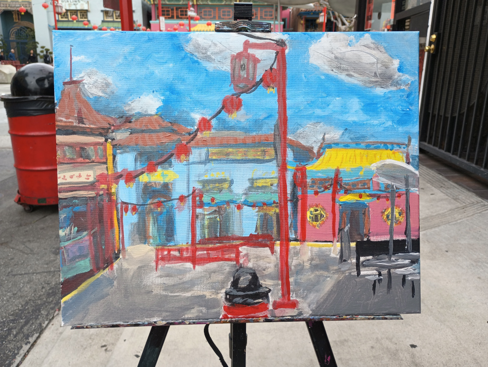 easel with painting Chinatown background
