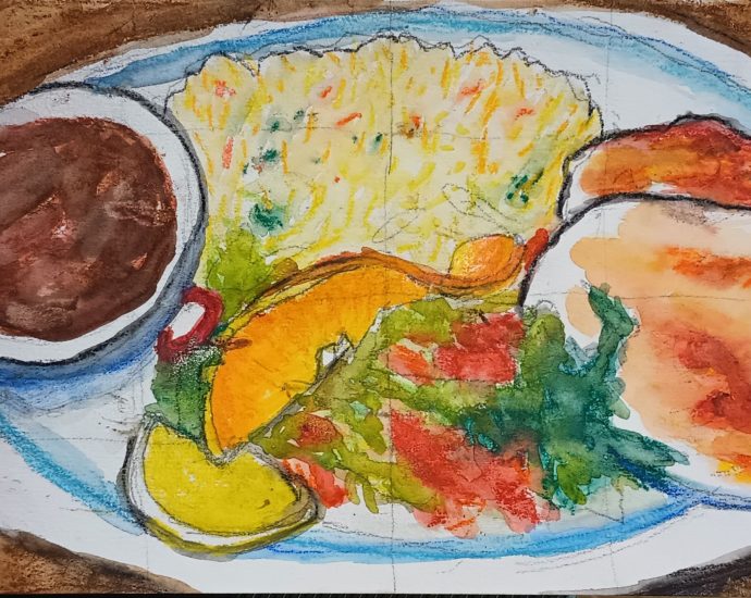 pupusas on a plate beans rice salad
